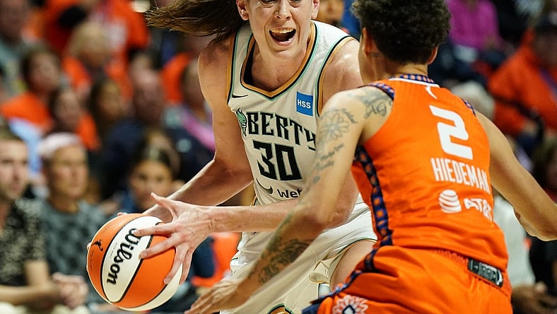 Sep 29, 2023; Uncasville, Connecticut, USA; New York Liberty forward Breanna Stewart (30) drives the ball against Connecticut Sun guard Natisha Hiedeman (2) in the second quarter during game three of the 2023 WNBA Playoffs at Mohegan Sun Arena. Mandatory Credit: David Butler II-USA TODAY Sports