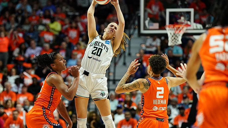 Sep 29, 2023; Uncasville, Connecticut, USA; New York Liberty guard Sabrina Ionescu (20) passes the ball against Connecticut Sun forward Alyssa Thomas (25) in the first half during game three of the 2023 WNBA Playoffs at Mohegan Sun Arena. Mandatory Credit: David Butler II-USA TODAY Sports