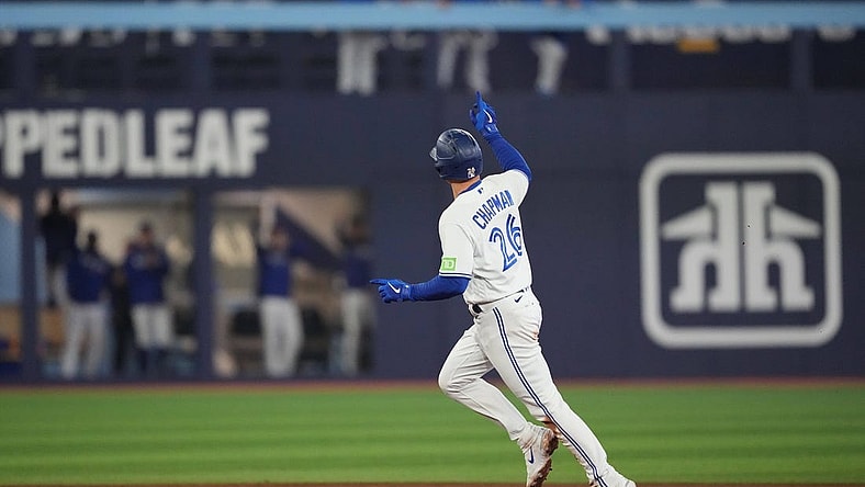 Sep 29, 2023; Toronto, Ontario, CAN; Toronto Blue Jays third baseman Matt Chapman (26) runs the bases and celebrates after hitting a home run against the Tampa Bay Rays during the fifth inning at Rogers Centre. Mandatory Credit: Nick Turchiaro-USA TODAY Sports