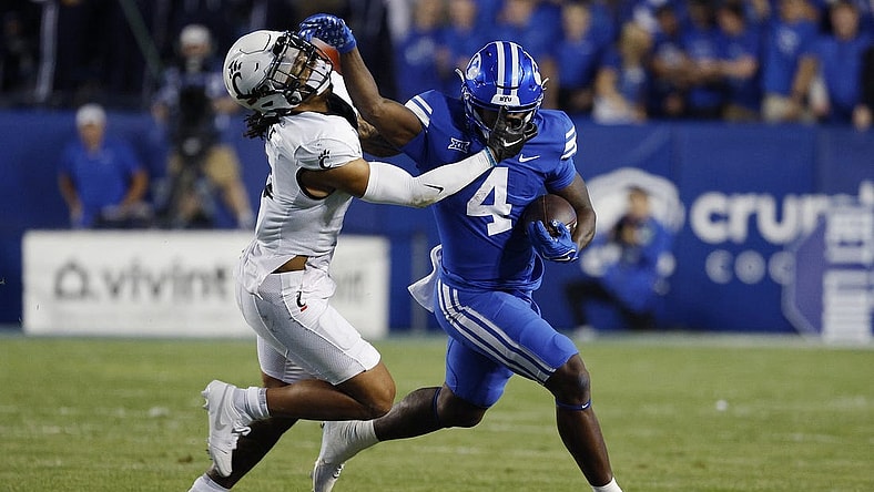 Sep 29, 2023; Provo, Utah, USA; Cincinnati Bearcats safety Deshawn Pace (3) covers Brigham Young Cougars running back Miles Davis (4) in the first half at LaVell Edwards Stadium. Mandatory Credit: Jeff Swinger-USA TODAY Sports