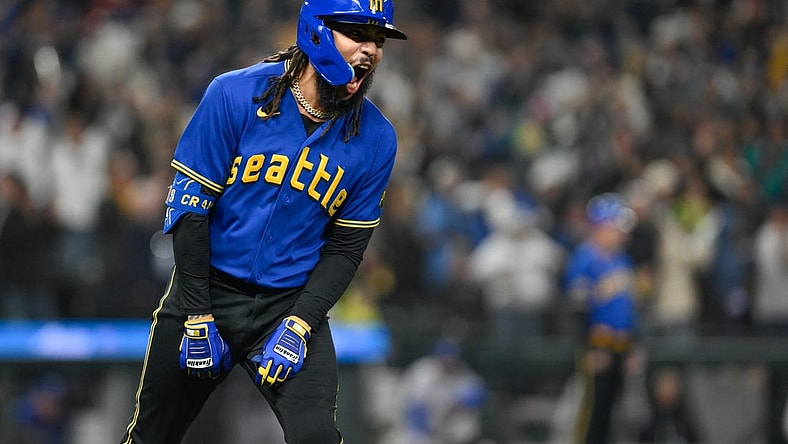 Sep 29, 2023; Seattle, Washington, USA; Seattle Mariners shortstop J.P. Crawford (3) celebrates after hitting a grand slam against the Texas Rangers during the fourth inning at T-Mobile Park. Mandatory Credit: Steven Bisig-USA TODAY Sports