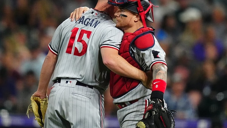Sep 29, 2023; Denver, Colorado, USA; Minnesota Twins relief pitcher Emilio Pagan (15) and catcher Christian Vazquez (8) celebrate defeating the Colorado Rockies at Coors Field. Mandatory Credit: Ron Chenoy-USA TODAY Sports
