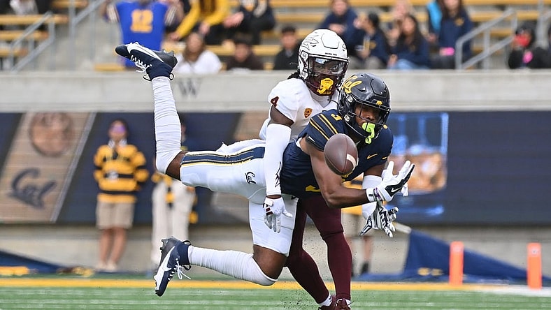 Sep 30, 2023; Berkeley, California, USA; Arizona State Sun Devils defensive back Demetries Ford (4) breaks up a pass intended for California Golden Bears wide receiver Jeremiah Hunter (3) during the first quarter at California Memorial Stadium. Mandatory Credit: Robert Edwards-USA TODAY Sports