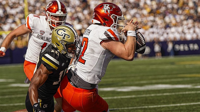 Sep 30, 2023; Atlanta, Georgia, USA; Bowling Green Falcons quarterback Camden Orth (12) tries to score at the pylon past Georgia Tech Yellow Jackets defensive back Kenan Johnson (10) during the first half at Hyundai Field. Mandatory Credit: Dale Zanine-USA TODAY Sports