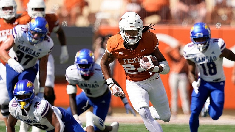 Texas Longhorns running back Jonathon Brooks makes a long run against the Kansas Jayhawks in the second quarter at Royal-Memorial Stadium on Saturday September 30, 2023.