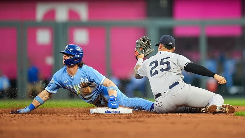 Sep 30, 2023; Kansas City, Missouri, USA; Kansas City Royals shortstop Bobby Witt Jr. (7) is caught stealing against New York Yankees second baseman Gleyber Torres (25) during the third inning at Kauffman Stadium. Mandatory Credit: Jay Biggerstaff-USA TODAY Sports
