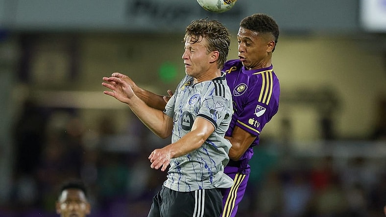 Sep 30, 2023; Orlando, Florida, USA;  Orlando City SC defender Rafael Santos (3) and CF Montreal midfielder Bryce Duke (10) battle for a head ball in the first half at Exploria Stadium. Mandatory Credit: Nathan Ray Seebeck-USA TODAY Sports