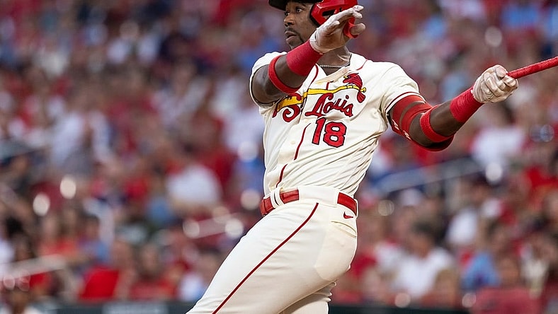 Sep 30, 2023; St. Louis, Missouri, USA; St. Louis Cardinals right fielder Jordan Walker (18) hits a two RBI double in the first inning at Busch Stadium. Mandatory Credit: Zach Dalin-USA TODAY Sports