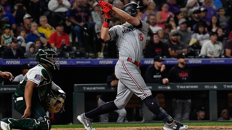 Sep 30, 2023; Denver, Colorado, USA; Minnesota Twins right fielder Max Kepler (26) hits a three run home run in the sixth inning against the Colorado Rockies at Coors Field. Mandatory Credit: John Leyba-USA TODAY Sports