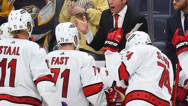 Oct 16, 2021; Nashville, Tennessee, USA; Carolina Hurricanes head coach Rod Brind'Amour talks during a timeout during the third period against the Nashville Predators at Bridgestone Arena. Mandatory Credit: Christopher Hanewinckel-USA TODAY Sports