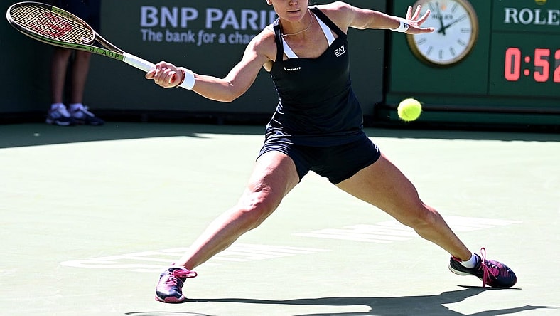 Mar 17, 2022; Indian Wells, CA, USA;   Veronika Kudermetova (RUS) hits a shot against Paula Badosa (ESP) at the BNP Paribas Open at the Indian Wells Tennis Garden. Mandatory Credit: Jayne Kamin-Oncea-USA TODAY Sports