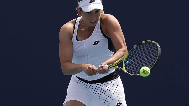 Mar 25, 2022; Miami Gardens, FL, USA; Elise Mertens (BEL) hits a backhand against Linda Fruhvirtova (CZE) (not pictured) in a second round women's match in the Miami Open at Hard Rock Stadium. Mandatory Credit: Geoff Burke-USA TODAY Sports
