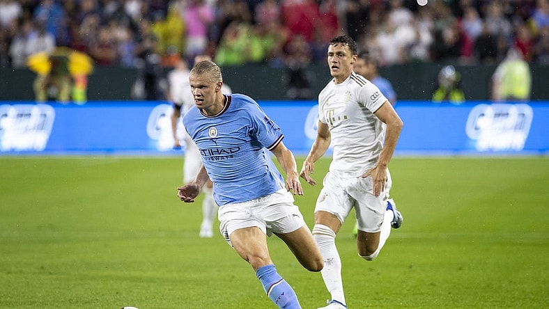 July 23, 2022; Green Bay, WI, USA; Manchester City forward Erling Haaland (9) runs the ball during the exhibition match against FC Bayern Munich on Saturday, July 23, 2022 at Lambeau Field in Green Bay, Wis. Mandatory Credit: Samantha Madar-USA TODAY Sports