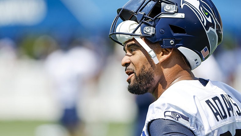 Jul 27, 2022; Renton, WA, USA; Seattle Seahawks safety Jamal Adams (33) talks with a teammate during training camp practice at Virginia Mason Athletic Center. Mandatory Credit: Joe Nicholson-USA TODAY Sports