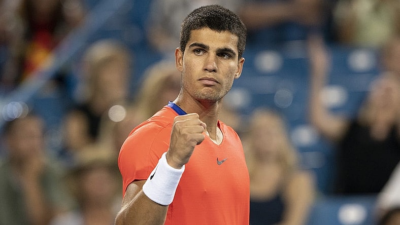 Aug 19, 2022; Cincinnati, OH, USA; Carlos Alcaraz (ESP) reacts to a point during his match against Cameron Norrie (GBR) at the Western & Southern Open at the Lindner Family Tennis Center. Mandatory Credit: Susan Mullane-USA TODAY Sports