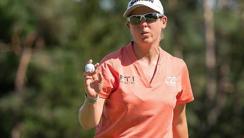 Aug 28, 2022; Ottawa, Ontario, CAN; Ashleigh Buhai from South Africa wraps up the 18th hole in the final round of the CP Women's Open golf tournament. Mandatory Credit: Marc DesRosiers-USA TODAY Sports