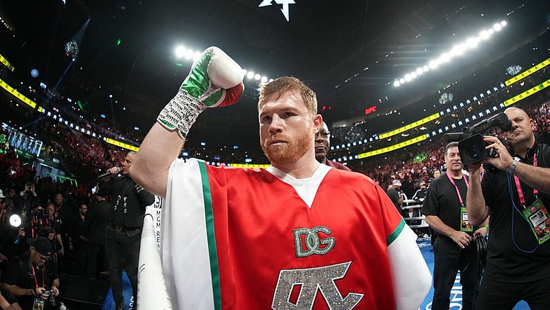 Sep 17, 2022; Las Vegas, Nevada, USA; Canelo Alvarez (red trunks) and Gennadiy Golovkin (white trunks) box during a middleweight championship bout at T-Mobile Arena. Mandatory Credit: Joe Camporeale-USA TODAY Sports