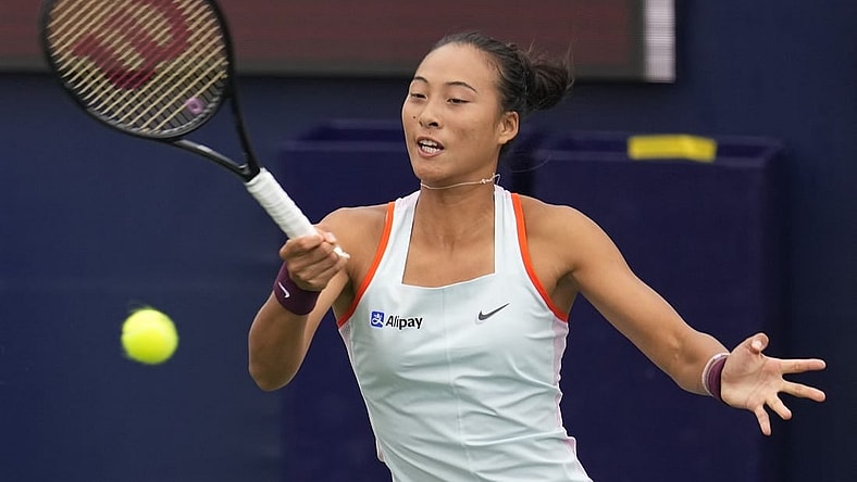 Oct 13, 2022; San Diego, California, US;  Qinwen Zheng of China hits the ball against Iga Swiatek of Poland during the San Diego Open at Barnes Tennis Center. Mandatory Credit: Ray Acevedo-USA TODAY Sports