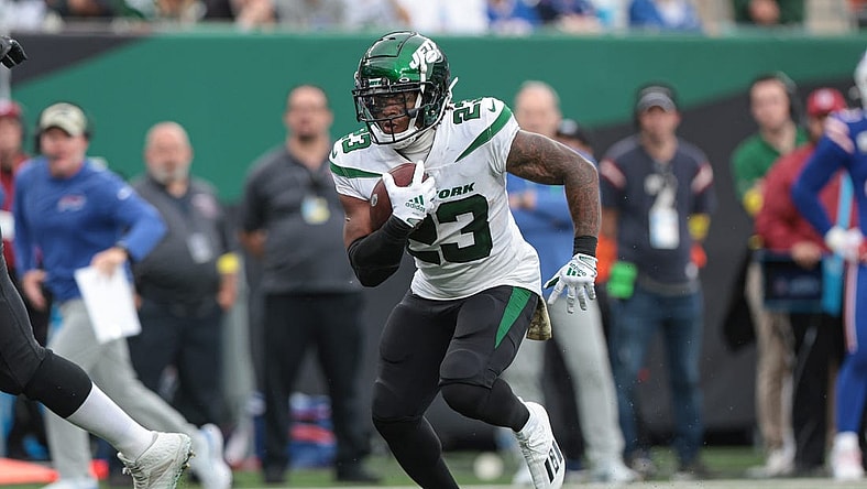 Nov 6, 2022; East Rutherford, New Jersey, USA; New York Jets running back James Robinson (23) carries the ball against the Buffalo Bills during the second half at MetLife Stadium. Mandatory Credit: Vincent Carchietta-USA TODAY Sports