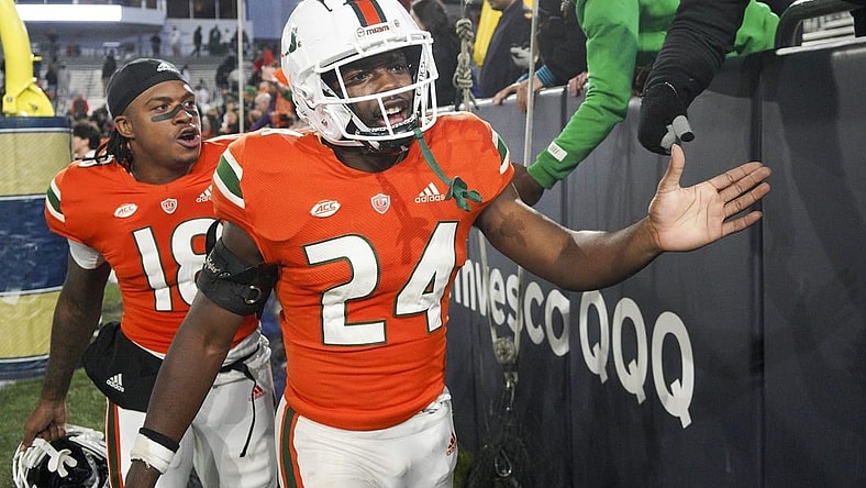 Nov 12, 2022; Atlanta, Georgia, USA; Miami Hurricanes safety Kamren Kinchens (24) celebrates with fans after a victory against the Georgia Tech Yellow Jackets at Bobby Dodd Stadium. Mandatory Credit: Brett Davis-USA TODAY Sports
