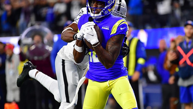 Dec 8, 2022; Inglewood, California, USA; Los Angeles Rams wide receiver Van Jefferson (12) catches a touchdown pass against the defense of Las Vegas Raiders cornerback Sam Webb (27) during the second half at SoFi Stadium. Mandatory Credit: Gary A. Vasquez-USA TODAY Sports