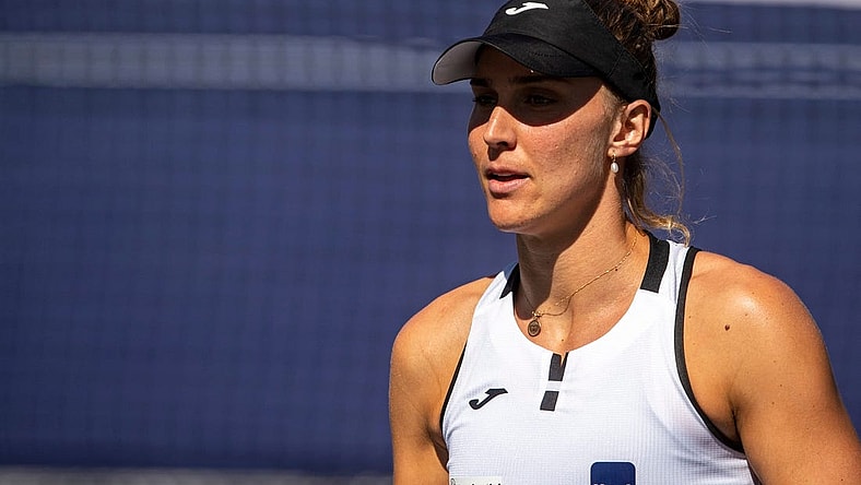 Beatriz Haddad Maia of Brazil heads back to serve to Emma Raducanu of Great Britain during their third-round match at the BNP Paribas Open at the Indian Wells Tennis Garden in Indian Wells, Calif., Monday, March 13, 2023.