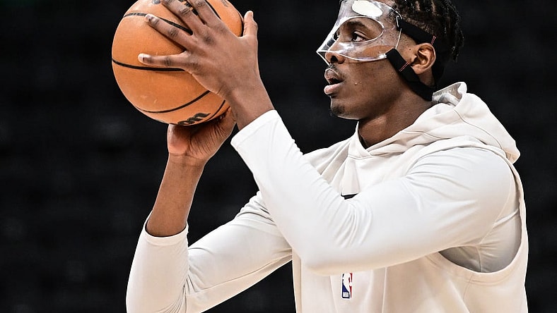 Mar 19, 2023; Milwaukee, Wisconsin, USA; Toronto Raptors center Christian Koloko (35) warms up before game against the Milwaukee Bucks at Fiserv Forum. Mandatory Credit: Benny Sieu-USA TODAY Sports