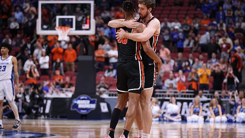 Mar 24, 2023; Louisville, KY, USA; Princeton Tigers forward Tosan Evbuomwan (20) and guard Jack Scott (5) react toward the end of a NCAA tournament round of sixteen loss to the Creighton Bluejays at KFC YUM! Center. Mandatory Credit: Jordan Prather-USA TODAY Sports