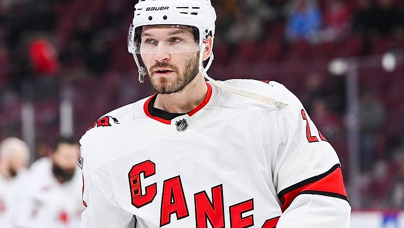Apr 1, 2023; Montreal, Quebec, CAN; Carolina Hurricanes defenseman Brett Pesce (22) looks on during warm-up before the game against the Montreal Canadiens at Bell Centre. Mandatory Credit: David Kirouac-USA TODAY Sports