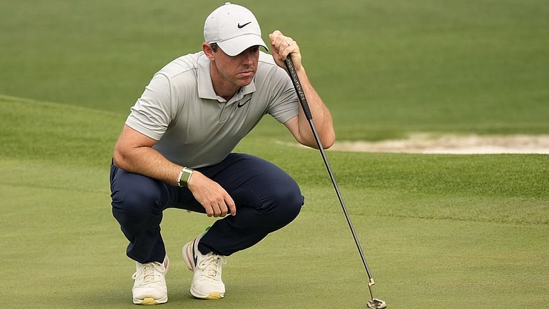 Apr 7, 2023; Augusta, Georgia, USA; Rory McIlroy lines up a putt on the second green during the second round of The Masters golf tournament. Mandatory Credit: Michael Madrid-USA TODAY Network