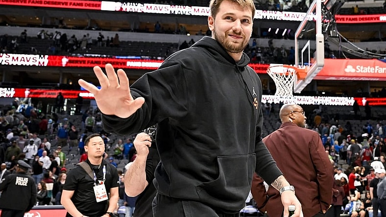 Apr 7, 2023; Dallas, Texas, USA; Dallas Mavericks guard Luka Doncic (77) waves to the crowd as he walks off the court after the Mavericks loss to the Chicago Bulls at the American Airlines Center. Mandatory Credit: Jerome Miron-USA TODAY Sports