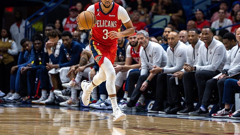 Apr 7, 2023; New Orleans, Louisiana, USA;  New Orleans Pelicans guard CJ McCollum (3) brings the ball up court against the New York Knicks during the second half at Smoothie King Center. Mandatory Credit: Stephen Lew-USA TODAY Sports