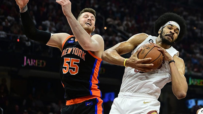 Apr 18, 2023; Cleveland, Ohio, USA; Cleveland Cavaliers center Jarrett Allen (31) grabs a rebound ahead of New York Knicks center Isaiah Hartenstein (55) during the second quarter of game two of the 2023 NBA playoffs at Rocket Mortgage FieldHouse. Mandatory Credit: Ken Blaze-USA TODAY Sports