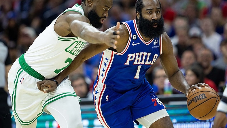 May 11, 2023; Philadelphia, Pennsylvania, USA; Philadelphia 76ers guard James Harden (1) dribbles the ball against Boston Celtics guard Jaylen Brown (7) during the first quarter in game six of the 2023 NBA playoffs at Wells Fargo Center. Mandatory Credit: Bill Streicher-USA TODAY Sports