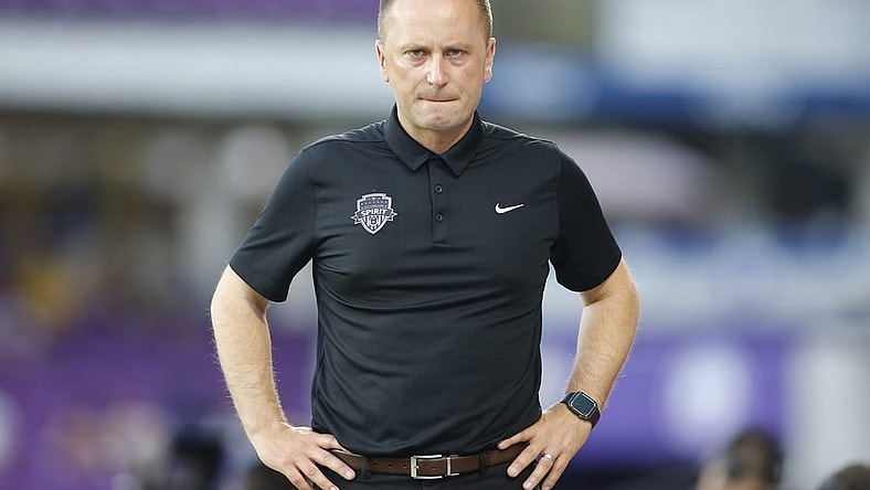 May 20, 2023; Orlando, Florida, USA; Washington Spirit head coach Mark Parsons reacts in the first half against the Orlando Pride at Exploria Stadium. Mandatory Credit: Russel Lansford-USA TODAY Sports