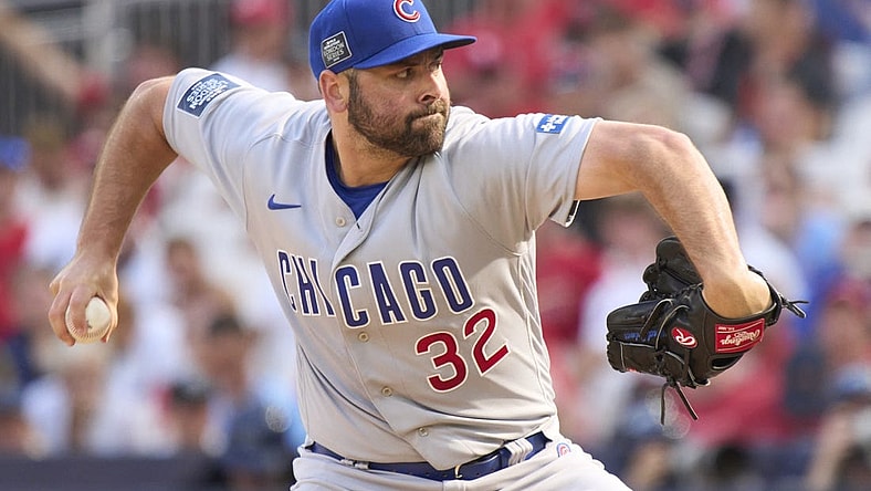 Jun 25, 2023; London, GBR, ENG;  Chicago Cubs relief pitcher Michael Fulmer (32) throws against the St. Louis Cardinals  in London series game two at London Stadium. Mandatory Credit: Peter van den Berg-USA TODAY Sports