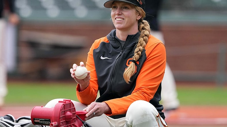 Jun 25, 2023; San Francisco, California, USA; San Francisco Giants major league assistant coach Alyssa Nakken (92) works on the field before the game against the Arizona Diamondbacks at Oracle Park. Mandatory Credit: Darren Yamashita-USA TODAY Sports