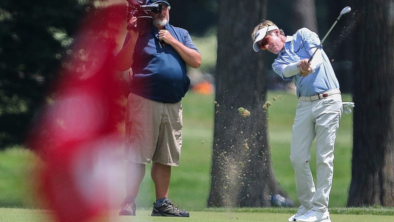 Brett Quigley hits his approach shot into the 9th green during the final round of the 2023 U.S. Senior Open on Sunday, July 2, 2023, at SentryWorld in Stevens Point, Wis. Quigley shot a round of 66 to finish in a tie for 4th place at 2-under par for the tournament.Tork Mason/USA TODAY NETWORK-Wisconsin
