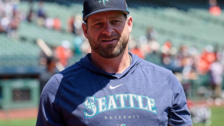 Jul 4, 2023; San Francisco, California, USA; Seattle Mariners bullpen coach and quality control coach Stephen Vogt (13) walks on the field before the game against the San Francisco Giants at Oracle Park. Mandatory Credit: Robert Edwards-USA TODAY Sports
