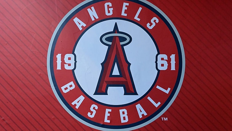Jul 21, 2023; Anaheim, California, USA;  Detailed view of the Los Angeles Angels team logo on the wall of the dugout at Angel Stadium. Mandatory Credit: Jayne Kamin-Oncea-USA TODAY Sports