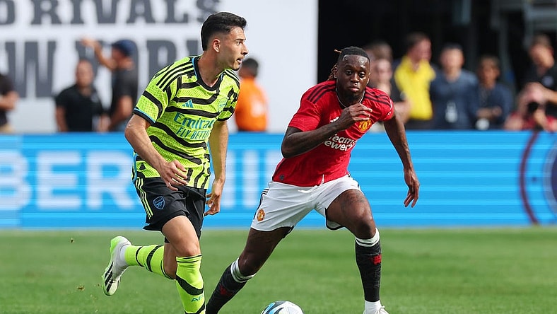 Jul 22, 2023; East Rutherford, New Jersey, USA; Arsenal forward Gabriel Martinelli (11) controls the ball in front of Manchester United defender Aaron Wan-Bissaka (29) during the first half at MetLife Stadium. Mandatory Credit: Vincent Carchietta-USA TODAY Sports