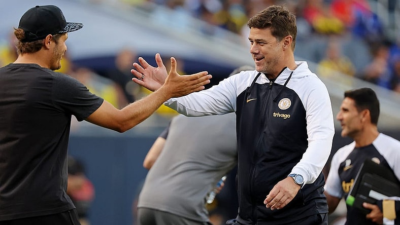 Aug 2, 2023; Chicago, Illinois, USA; Borussia Dortmund manager Edin Terzic (left) shakes hands with Chelsea manager Mauricio Pochettino (right) before the game at Soldier Field. Mandatory Credit: Jon Durr-USA TODAY Sports