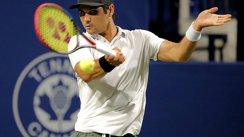 Aug 9, 2023; Toronto, Ontario, Canada; Marcos Giron (USA) hits a ball to Holger Rune (not pictured) at Sobeys Stadium. Mandatory Credit: John E. Sokolowski-USA TODAY Sports