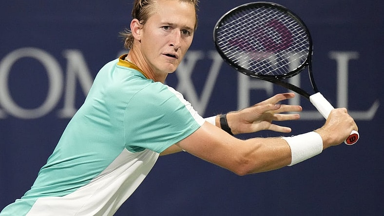 Aug 9, 2023; Toronto, Ontario, Canada; Sebastian Korda (USA) chases a ball hit by Aleksandar Vukic (not pictured) at Sobeys Stadium. Mandatory Credit: John E. Sokolowski-USA TODAY Sports