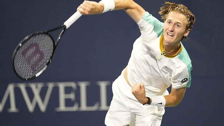 Aug 9, 2023; Toronto, Ontario, Canada; Sebastian Korda (USA) serves a ball to Aleksandar Vukic (not pictured) at Sobeys Stadium. Mandatory Credit: John E. Sokolowski-USA TODAY Sports