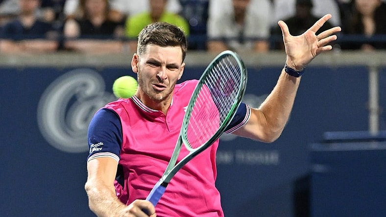 Aug 10, 2023; Toronto, Ontario, Canada; Hubert Hurkacz (POL)  plays a shot against Carlos Alcaraz (ESP) (not pictured) in third round play at Sobeys Stadium. Mandatory Credit: Dan Hamilton-USA TODAY Sports