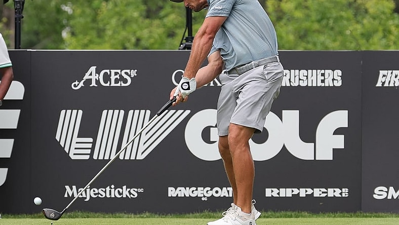 Aug 12, 2023; Bedminster, New Jersey, USA; Bryson DeChambeau plays his shot from the ninth tee during the second round of the LIV Golf Bedminster golf tournament at Trump National Bedminster. Mandatory Credit: Vincent Carchietta-USA TODAY Sports