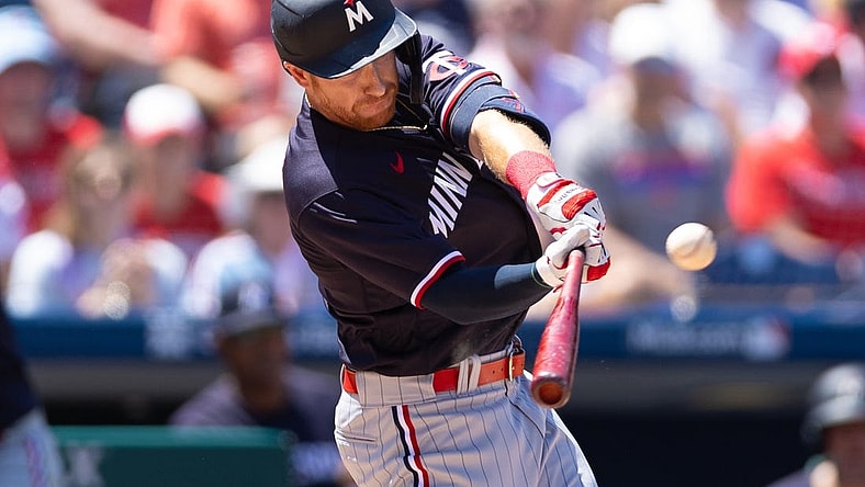 Aug 13, 2023; Philadelphia, Pennsylvania, USA; Minnesota Twins left fielder Jordan Luplow (16) hits a home run during the first inning against the Philadelphia Phillies at Citizens Bank Park. Mandatory Credit: Bill Streicher-USA TODAY Sports