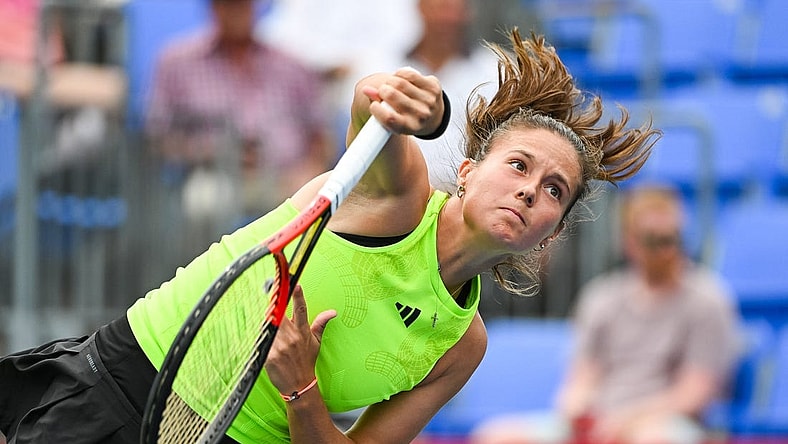Aug 10, 2023; Montreal, Quebec, Canada; Daria Kasatkina serves the ball to Marie Bouzkova (CZE) (not pictured) during third round play at IGA Stadium. Mandatory Credit: David Kirouac-USA TODAY Sports