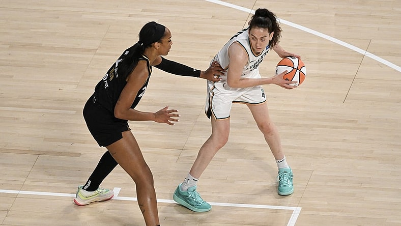 Aug 15, 2023; Las Vegas, Nevada, USA; Las Vegas Aces forward A'ja Wilson (22) defends New York Liberty forward Breanna Stewart (30) during the first quarter at Michelob Ultra Arena. Mandatory Credit: Candice Ward-USA TODAY Sports